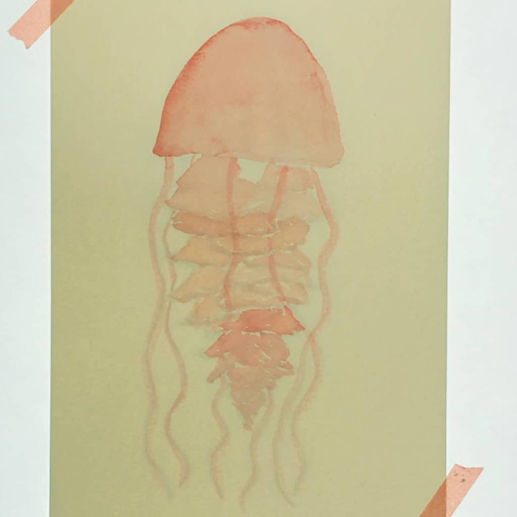 Step 2: Outline your jellyfish with the lightest shade of watercolor