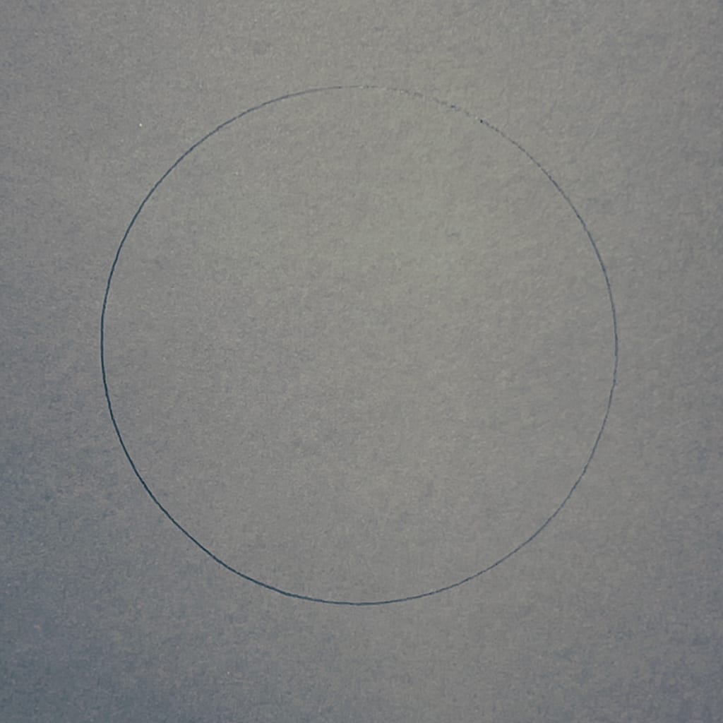 Step 1: Draw a circle in the middle of your paper