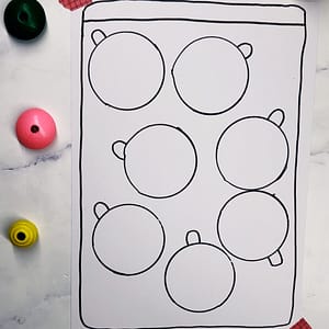 Step 2: Fill your page with circles and add a small semi-circle tab to each circle