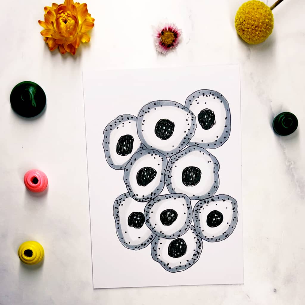 Step 5: Use a black and white pen to add irregular dots to your circles