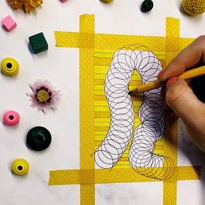 Step 7: Grab a soft pencil and add some lines on the sides of your line of circles