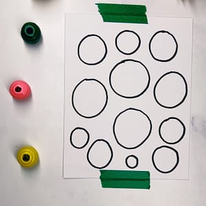 Step 1: Begin by drawing freeform circles on a piece of paper