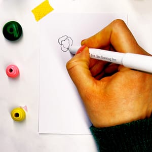 Step 1: Start with a dot and overlapping scribbled petals