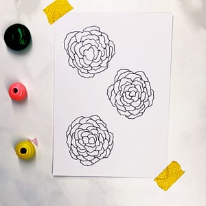 Step 2: Add petals in a circular motion. Stop when it's the right size for you.