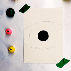 Step 3: To give your drawing the classic eye shape, add semi-circles to the top and bottom of your iris.