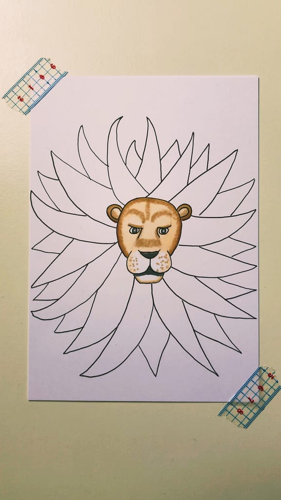 Step 2: Color the face of the lion