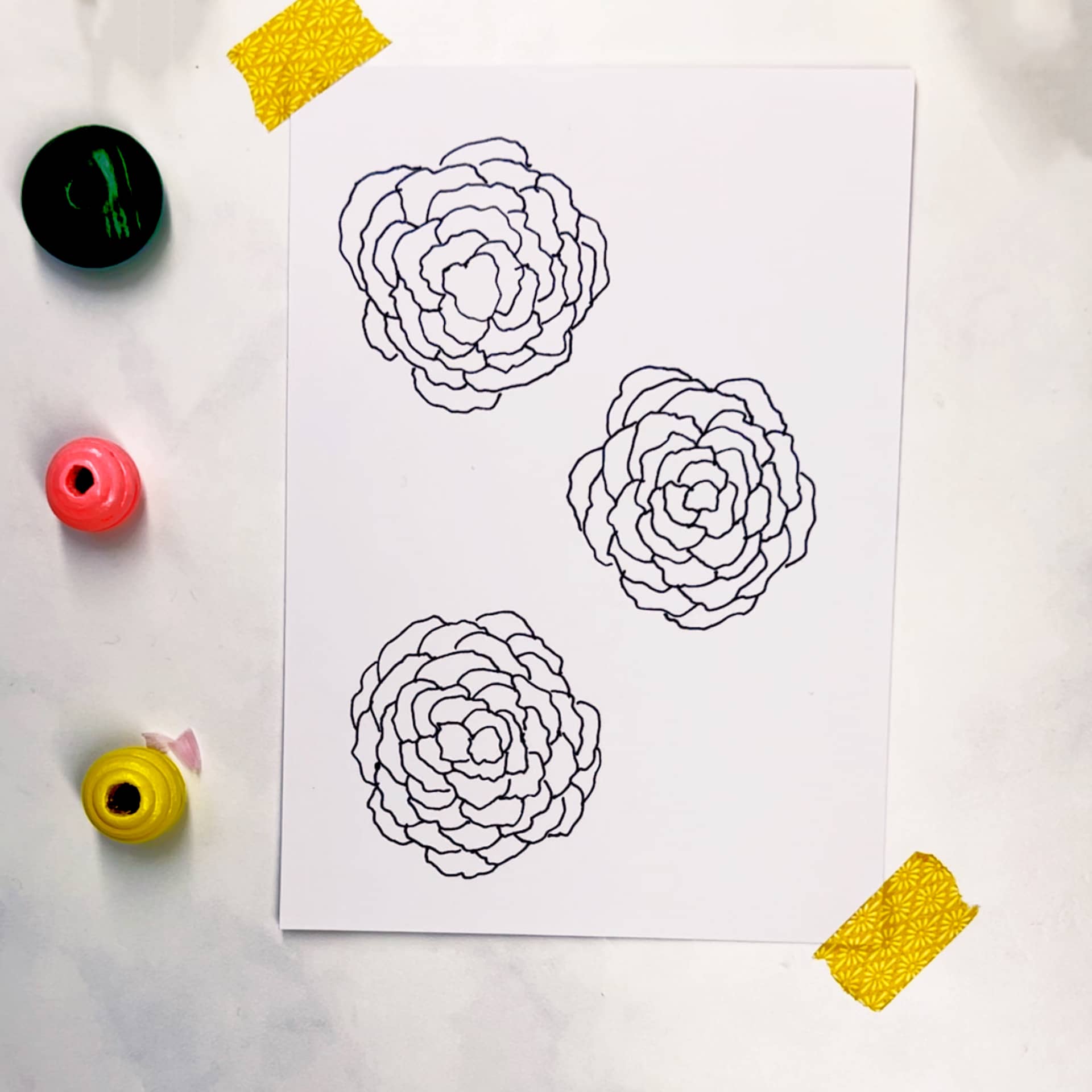 Step 2: Add petals in a circular motion. Stop when it's the right size for you.