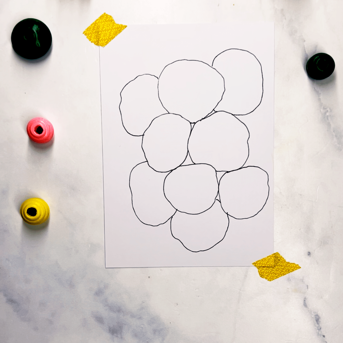 Step 1: Start by drawing several overlapping wobbly circles