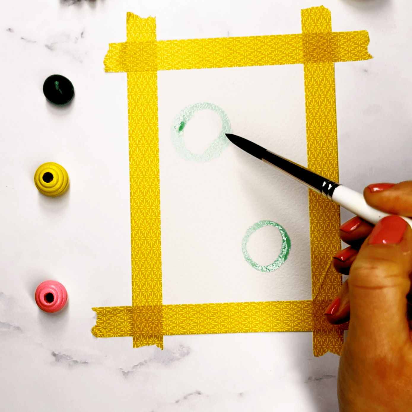 Step 1: paint the outline of a few circles