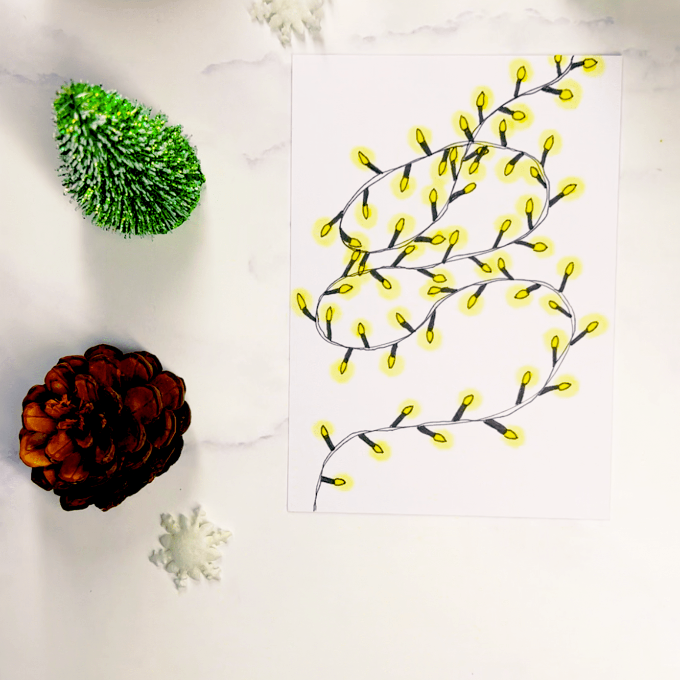 Step 5: Use a lighter yellow to create a soft halo effect around each bulb